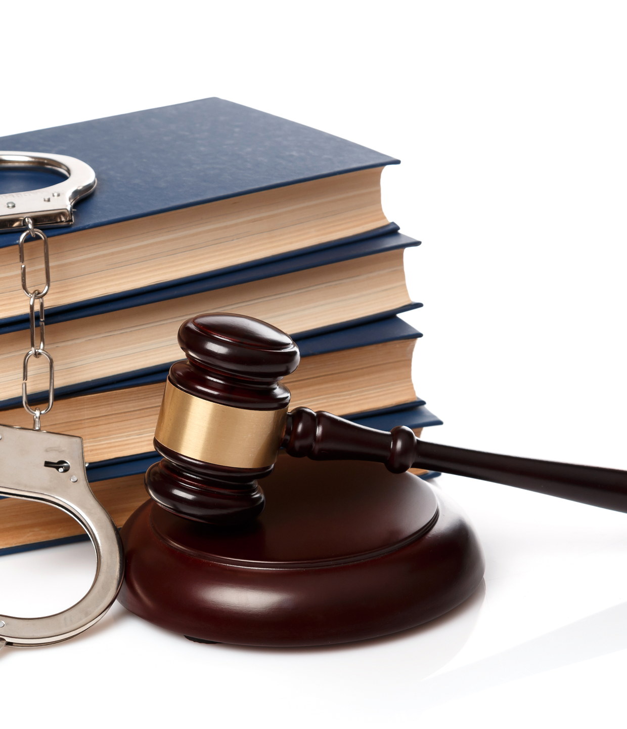 A stack of law books with a gavel and a pair of handcuffs &mdash; North Bergen criminal defense