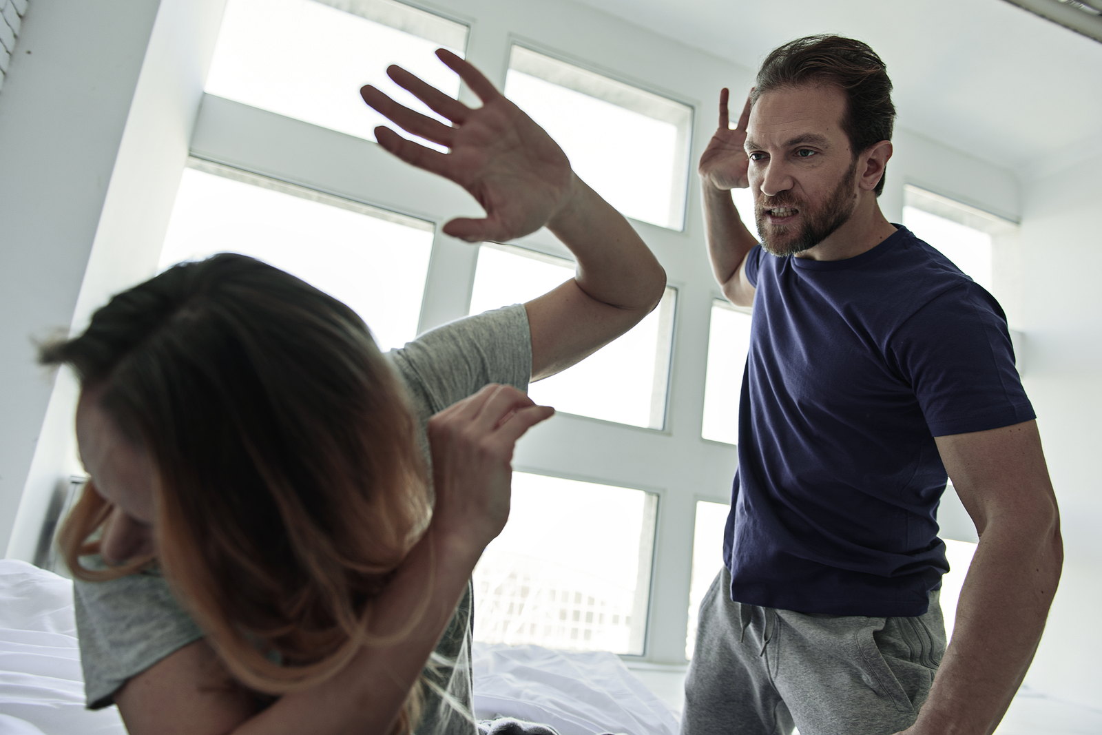 An argument between two people in a home