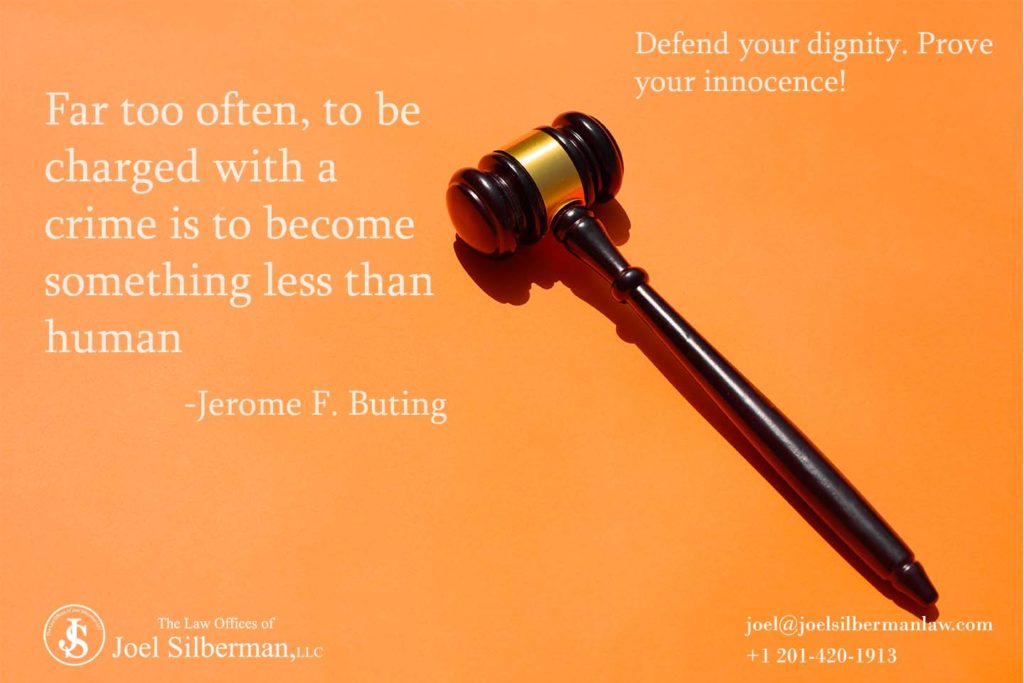 Charged with a crime is to become something less than human